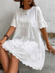 Embroidered Dress with a Hollowed-Out Lining in a Pure Color.