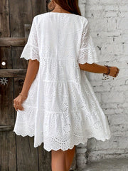 Embroidered Dress with a Hollowed-Out Lining in a Pure Color.
