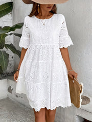 Embroidered Dress with a Hollowed-Out Lining in a Pure Color.