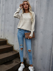 Autumn and winter pure color simple round neck long sleeved women's knitted sweater