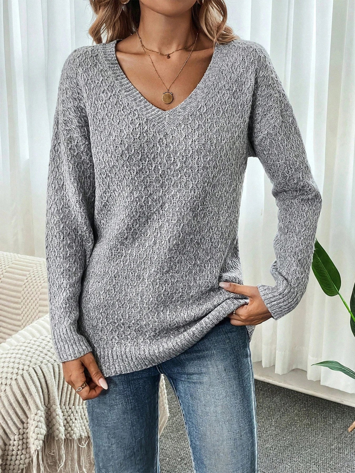 Autumn and winter women's casual V-neck long sleeved knitted sweater